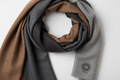 Gamma unisex charcoal scarf with Gamma logo at hem